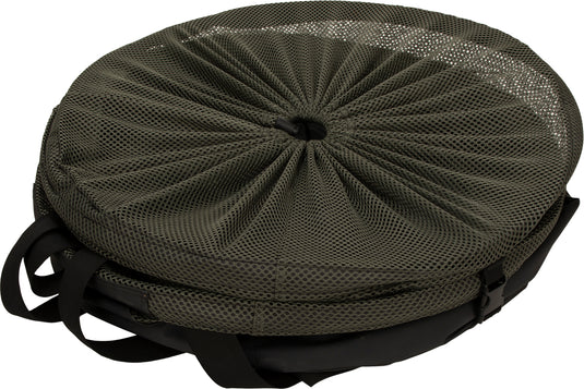 A Large Stand-Up Decoy Bag 2.0 with a round green bag, black strap, and mesh top. The bag stands up on its own, making loading and unloading decoys easier. Collapses to 3" for convenient storage.