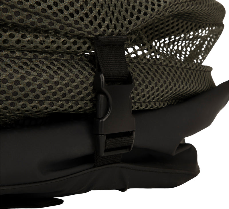 A close-up of the Large Stand-Up Decoy Bag 2.0, featuring a black buckle on a belt, a knitted object, and a black fabric strap.
