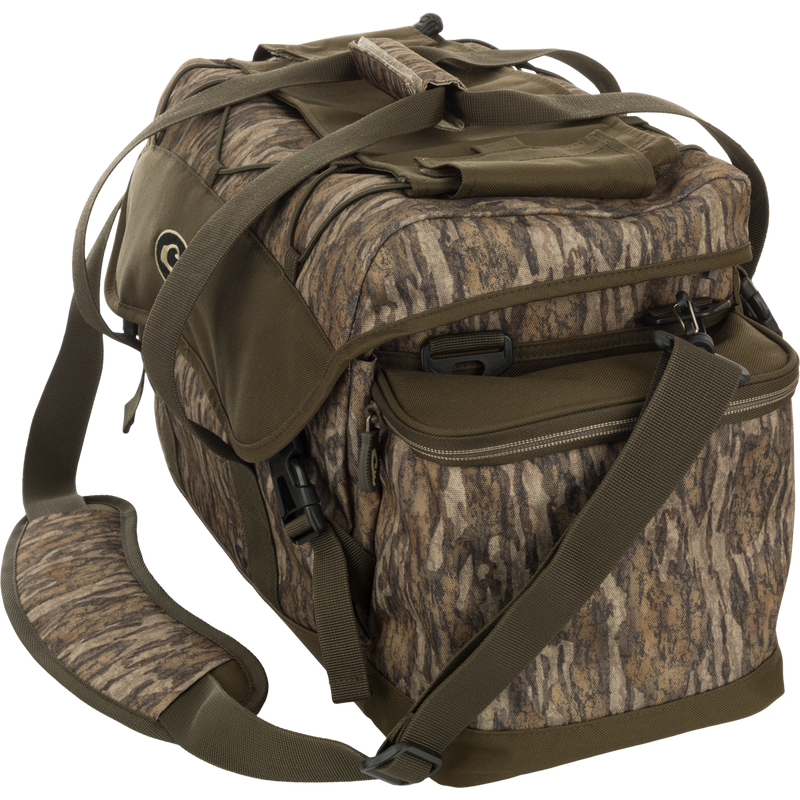 Large Blind Bag: A camouflage bag with straps, loaded with 18 pockets for organizing gear. Waterproof, durable, and abrasion-resistant. Adjustable shoulder strap. Dimensions: 18
