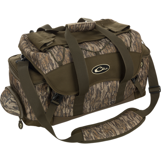 A camouflage duffel bag with straps and multiple pockets for organizing gear.