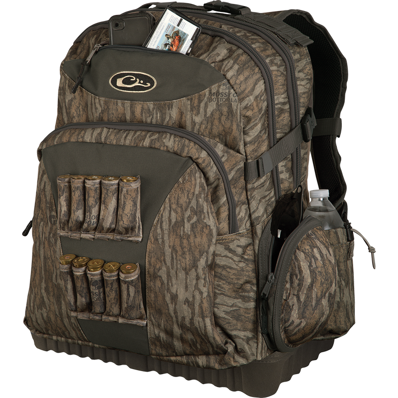 Swamp Sole Backpack: A rugged bag with front shell loops, outer storage pockets, and hydration compatibility for hunting gear and essentials.