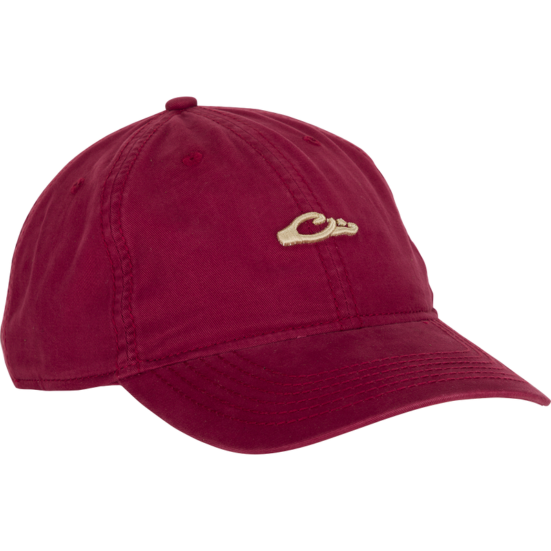 Cotton Twill Logo Cap - A low-profile red hat with a gold hand logo. Crafted with 100% cotton twill, leather strap backing with brass buckle, and contoured bill. Perfect for pushing yourself to the limit in style.