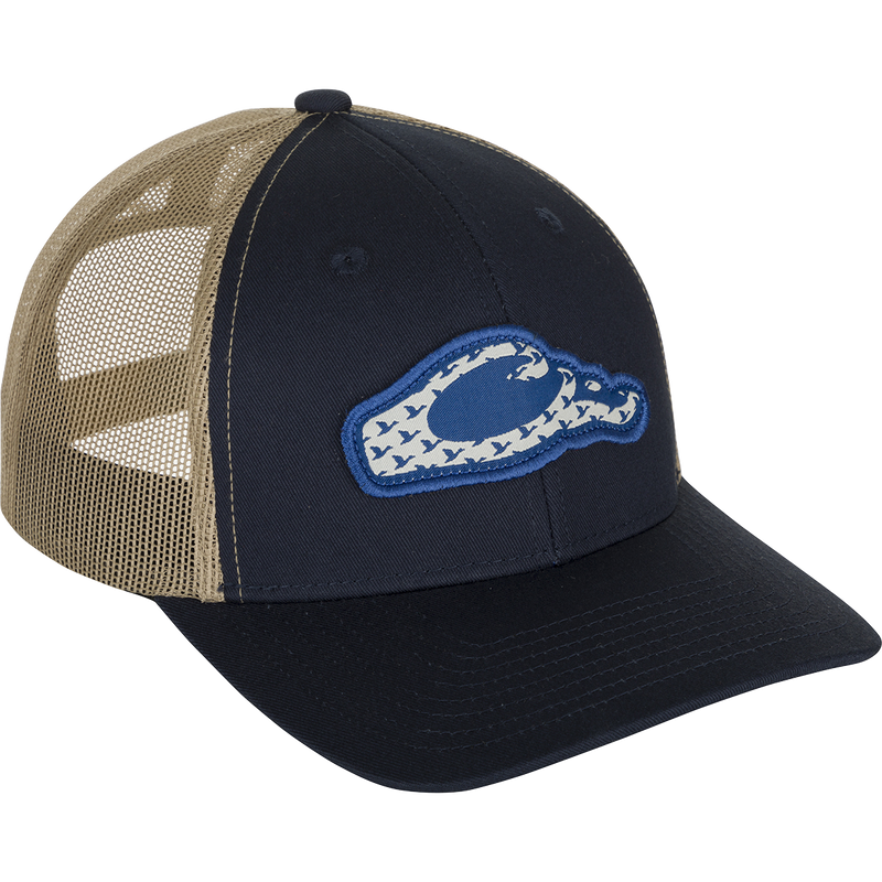 Drake 6 Panel Migrator Cap: A stylish trucker cap with a raised Drake head logo featuring migrating ducks. Breathable and comfortable for everyday wear.