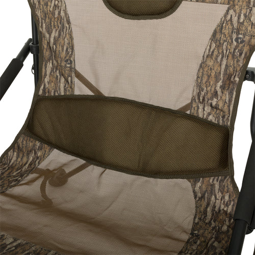 A close-up of the XL Low Profile Hunting Chair, a rugged and comfortable chair with a fabric sling-style seat and padded lumbar support. Foldable and easy to carry with a shoulder strap. Perfect for low-profile hunting situations.
