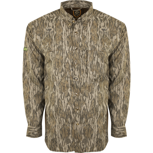 A long sleeved shirt with a camouflage pattern, featuring mesh back and side panels for breathability. Ideal for warm weather hunts.