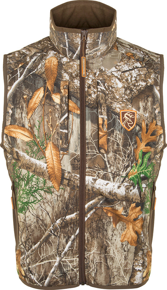 Camo Tech Vest with Agion Active XL: A camouflage vest with leaves and branches, designed for bow hunters. Allows quiet, precise movements with complete arm mobility. Features multiple pockets and windproof lining.