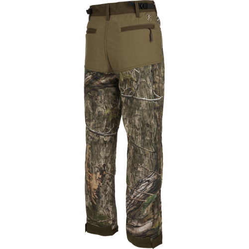 A pair of Standstill Windproof Pants with Agion Active XL®, perfect for late-season hunts. Soft, quiet, and durable fabric protects against harsh cold and winds. Features adjustable waist and cuffs, multiple pockets.
