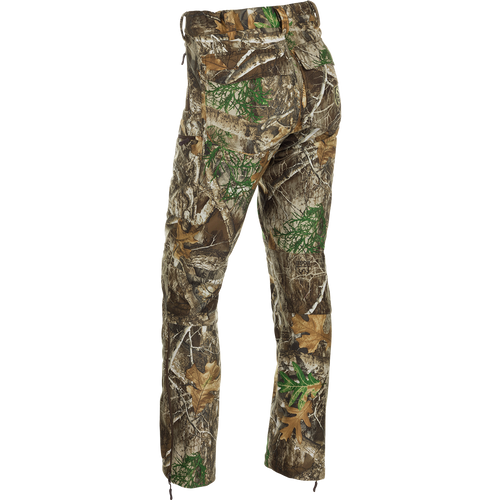 MST Microfleece Softshell Pants with camouflage pattern, 4-way stretch, and moisture-repellent treatment. Features scent control technology, comfortable fit, articulated knees, and easy movement.