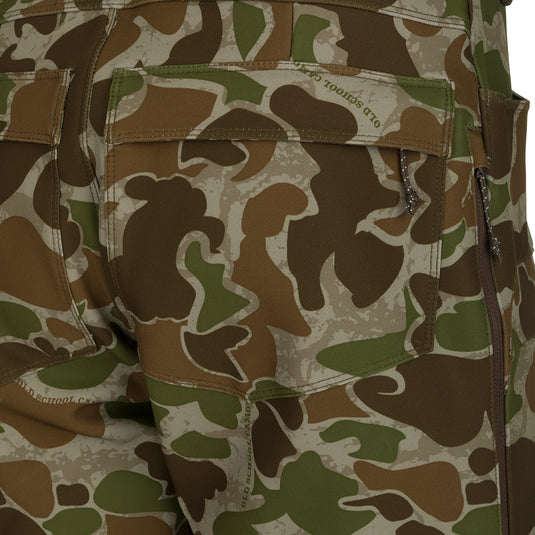 A close-up of the Pursuit Tech Stretch Pant with Agion Active XL® in camouflage pattern, featuring zippered pockets and vents. Lightweight and durable, perfect for early-mid season big game hunting.