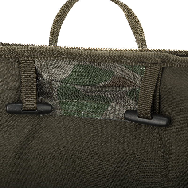 Non-Typical Rucksack: A close-up of a bag with versatile pockets and MOLLE loops for customizable functionality. Perfect for hunting necessities.