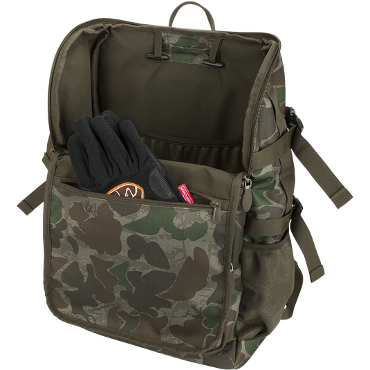 Non-Typical Rucksack: A camouflage backpack with gloves inside, perfect for hunting. Versatile pockets, MOLLE loops, and adjustable straps for easy access and customizable functionality.