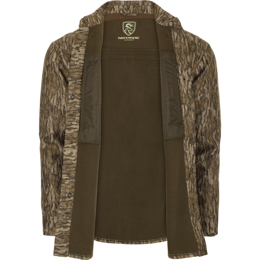 MST Microfleece Softshell Shirt: A camouflage jacket with a deer logo, featuring wind-resistant fabric, microfleece lining, scent control technology, 4-way stretch, and convenient pockets.