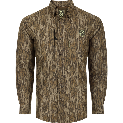 MST Microfleece Softshell Shirt: A long-sleeved shirt with a tree pattern and logo. Made of wind-resistant fabric with a microfleece lining. Features scent control technology, 7-button placket, gusseted underarm, 4-way stretch, and convenient pockets. Ideal for hunting and outdoor activities.