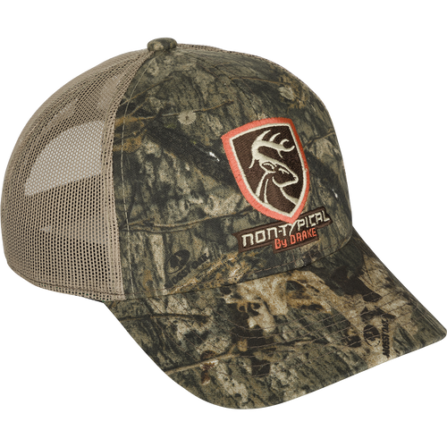 Non-Typical Logo Camo Mesh Back Cap with a logo on a hat made of 100% cotton twill and breathable mesh on the back. Adjustable with a rear hook and loop closure.