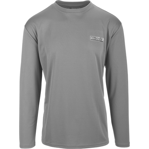 A versatile Performance Mesh Crew with built-in stretch, UPF 50 sun protection, and moisture-wicking fabric. Features thumbholes for added sleeve protection and a square hem. Perfect for outdoor enthusiasts.