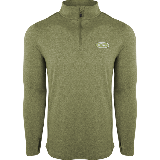A close-up of the Drake Microlite Performance ¼ Zip Heather shirt with a logo on it, featuring a zipper and raglan sleeves.