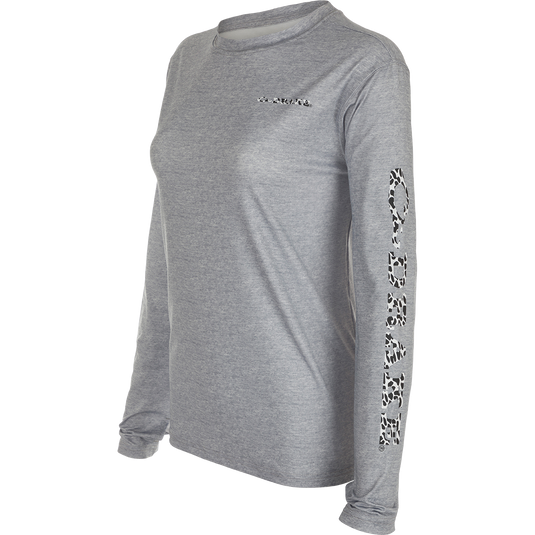 Women's Performance Crew Heather Shirt, a lightweight grey long sleeved top with black and white animal print on sleeve. Built-In Cooling, UPF 50, Moisture Wicking, Breathable Stretch, and Quick Drying.