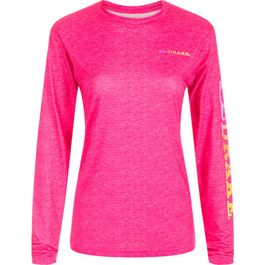 Women's Performance Crew Heather Shirt, a lightweight pink long sleeved top with fun sleeve prints. Features include Built-In Cooling, UPF 50, Moisture Wicking, Breathable Stretch, and Quick Drying. Perfect for outdoor activities.