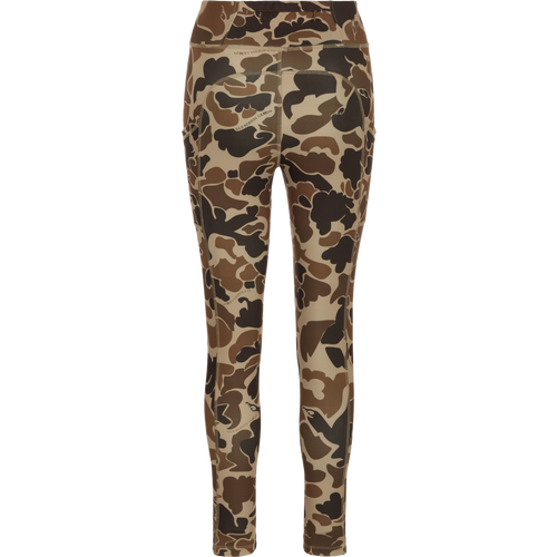 A versatile high-performance legging with a 4-way stretch fabric, angled side seam pockets, and a back zippered waist pocket. Women's Commando Printed Legging in Old School Camo.