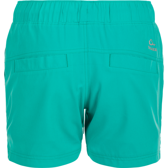 Women's Commando Lined Short 4.5": A close-up of versatile shorts with built-in liner, scalloped hem, and elastic waistband.