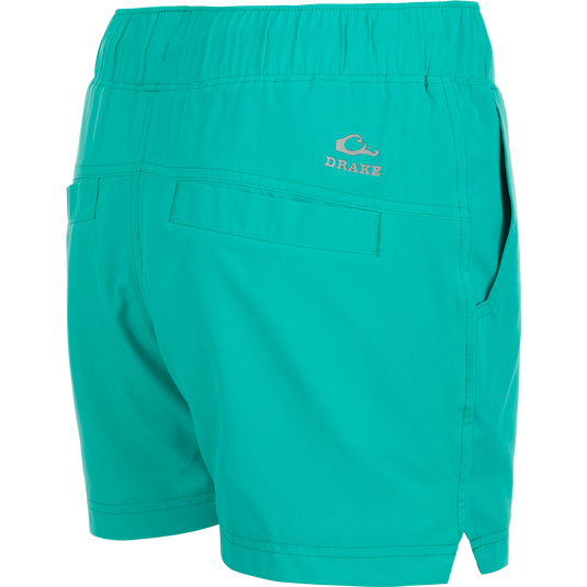 A pair of women's Commando Lined Shorts with 4.5" inseam, featuring clean lines, scalloped hem, and elastic waistband with drawstring. Shell fabric is 88% polyester and 12% spandex, offering 4-way stretch, quick-drying, and moisture-wicking properties. Includes front slash and back mesh pockets, side notch hem, and built-in quick-dry liner. Perfect for gym or beach.