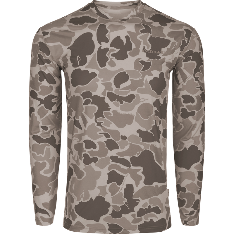 Youth Performance Crew L/S: A lightweight, camo-patterned long-sleeved shirt with built-in cooling, moisture-wicking, and quick-drying features. Offers UPF 50 sun protection.