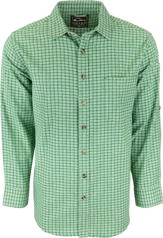 A green and white checkered shirt with an open collar and left chest pocket. Made of soft-washed 100% cotton for comfort. Perfect for a casual and stylish look. From Drake Waterfowl, known for high-quality hunting gear and clothing.