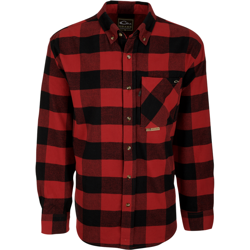 A close-up of the Autumn Brushed Twill Shirt, a red and black plaid shirt with a button-down collar and left chest pocket with hidden zippered pocket. Made from 100% brushed cotton twill. Perfect for fall and winter outdoor days.