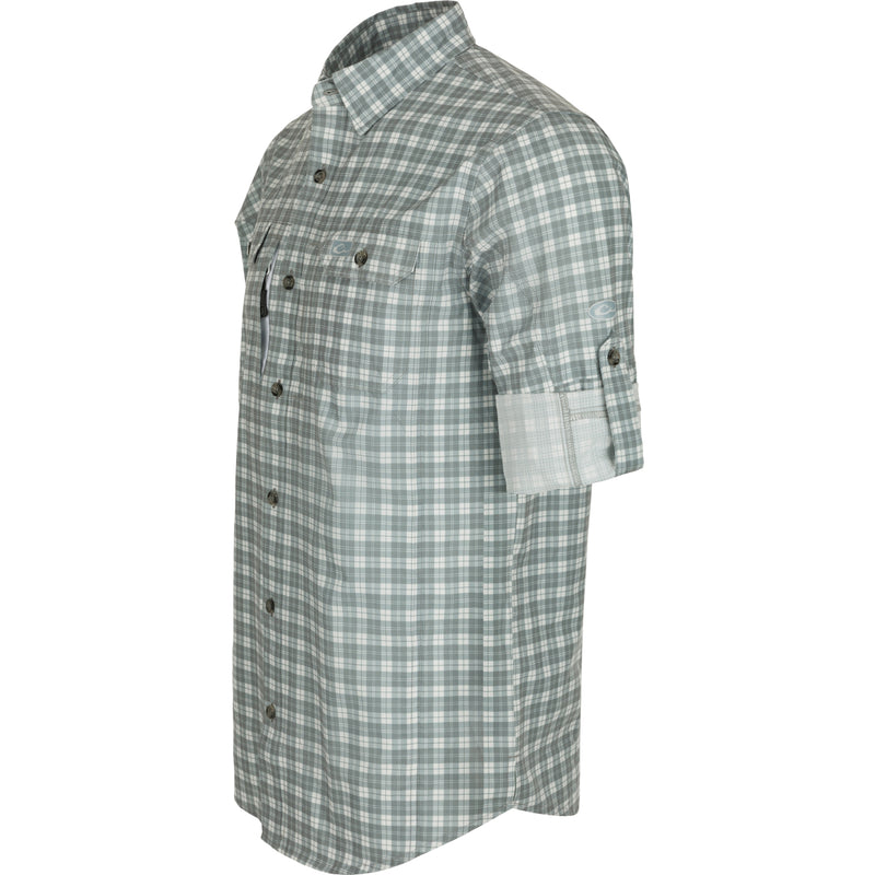 A close-up of the Drake Hunter Creek Check Plaid Shirt, featuring a hidden button-down collar, vented back cape, and two button-through flap chest pockets. Made from lightweight micro-mesh fabric with moisture-wicking and UPF30 sun protection.