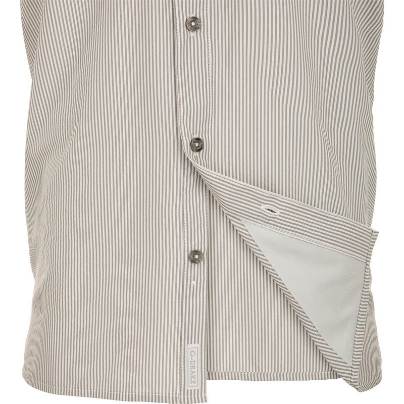 Classic Seersucker Stripe Shirt L/S: A close-up of a shirt with a button-down collar, hidden zippered chest pocket, and Magnattach™ closure.