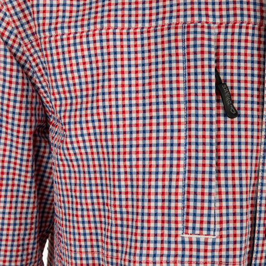 Classic Seersucker Grid Check Shirt L/S: A close-up of a black zipper on a red and blue checkered fabric shirt with hidden chest pockets and a button-down collar.