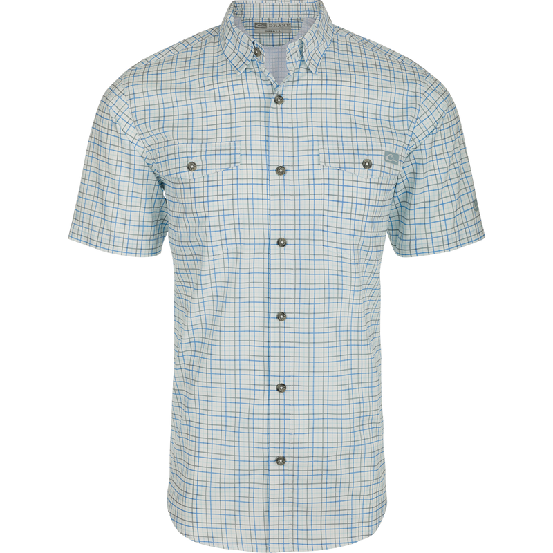 A classic fit Frat Tattersall Shirt with a hidden button-down collar, two chest pockets, and a vented cape back. Made from lightweight performance fabric with UPF30 sun protection and moisture-wicking properties. Sculpted hem and built-in sunglass wipe.