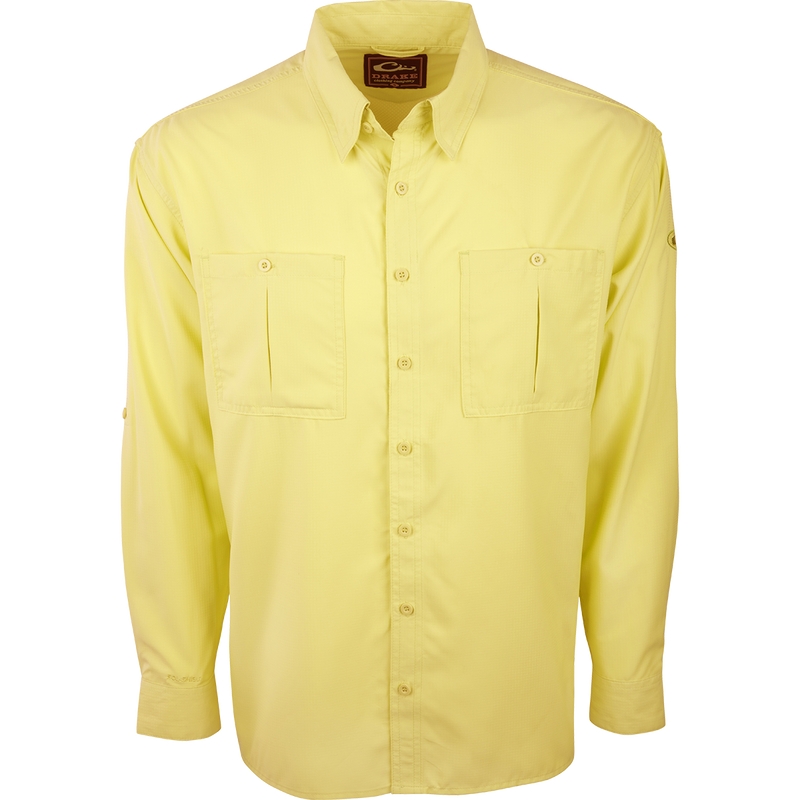 A yellow long sleeved Flyweight Shirt with vented back and chest pockets, made of ultra-lightweight polyester for quick-drying and moisture-wicking. Provides UPF 50+ sun protection.