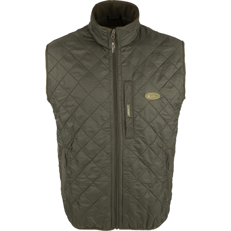 Delta Quilted Fleece Lined Vest: A quilted outer shell with micro-fleece lining for warmth. Features Magnattach™ pocket and slash pockets for storage.