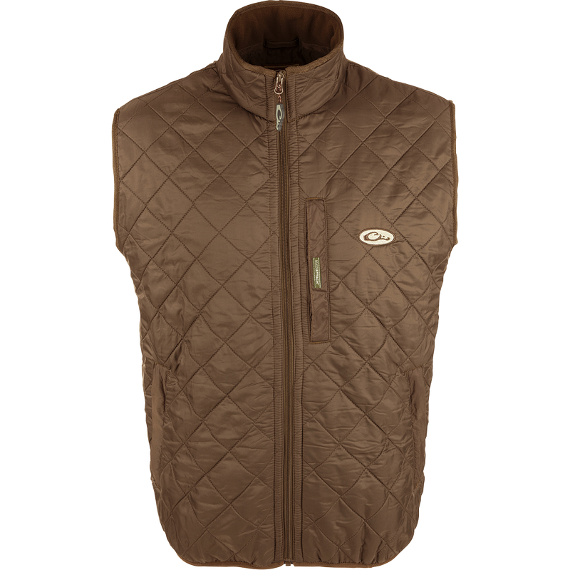 Delta Quilted Fleece Lined Vest: A quilted jacket with micro-fleece lining for enhanced warmth. Features a Magnattach™ pocket and lower slash pockets with fleece linings. 