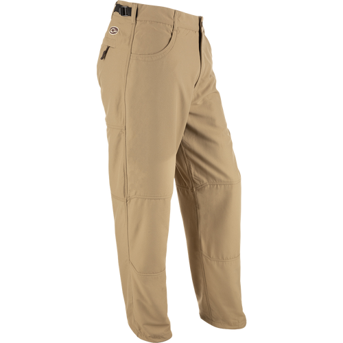 MST Jean Cut Wader Pant: Tan pants with adjustable waist and ankle, front slash pockets, and zippered rear pocket. Water-resistant and windproof Refuge HS™ fabric with 280g micro-fleece lining. Ideal for hunting and fishing.