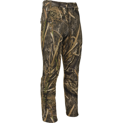 MST Ultimate Wader Pants: Camouflage pants with adjustable ankle fit for wader use or casual wear. Made of polyester fleece with Sherpa fleece lining. Features side-elastic waist, silicone grip waistband, 4-way stretch, gusseted crotch, articulated knees, and zippered rear security pockets.