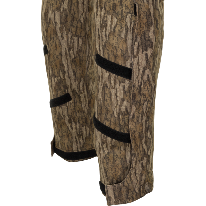 MST Ultimate Wader Bib: Camouflage shorts with Sherpa-lined pockets and zippered security pockets. Four-way stretch for easy movement.