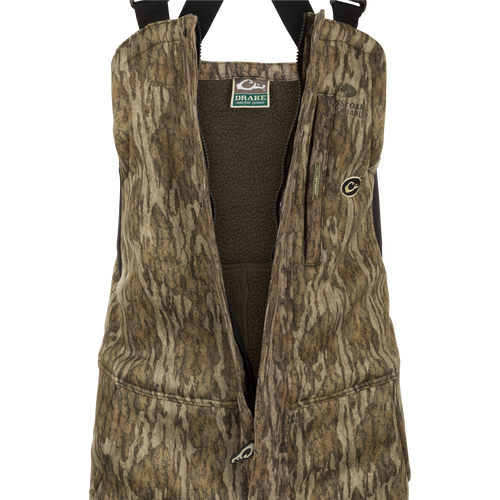 MST Ultimate Wader Bib: A vest with a logo and multiple pockets for storage. Made of polyester fleece with a Sherpa fleece lining.