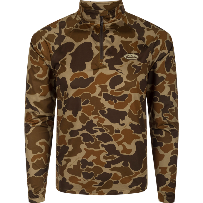A close-up of the EST Microlite 1/4 Zip Pullover, showcasing its camouflage pattern and raglan sleeves for increased range-of-motion.