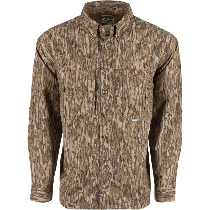 A lightweight, breathable Wingshooter's Shirt with a tree pattern. Features vents, mesh, and button tabs on sleeves. Perfect for hunting and shooting.