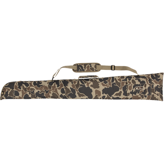 A side-opening gun case made of rugged HD2™ material, featuring a camouflage design. Includes a top carry handle and adjustable strap for easy transport. Accommodates shotguns up to 52" in length.