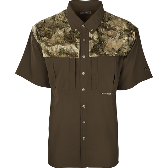 A brown Camo Flyweight Wingshooter's Shirt with a lightweight, breathable design. Features include UPF 50+ sun protection, vented mesh back, and multiple chest pockets. Perfect for early season hunting.