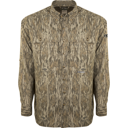 A lightweight, breathable EST Camo Flyweight Wingshooter's Shirt with a camouflage pattern. Made of 100% polyester for quick drying and moisture-wicking. Features include UPF 50+ sun protection, vented mesh back, and multiple chest pockets. Perfect for early season hunting.