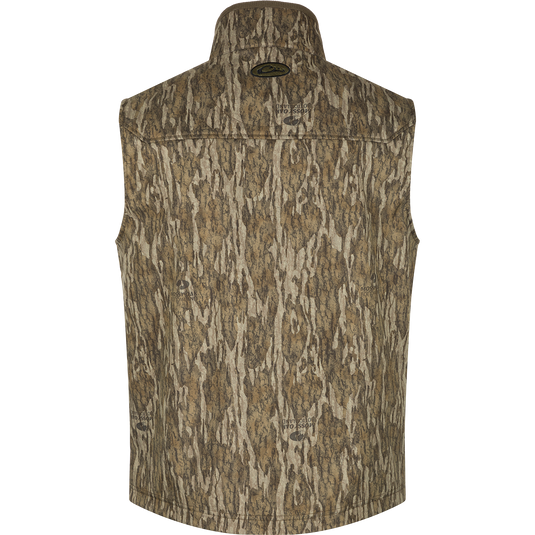 MST Windproof Softshell Vest with tree pattern, Magnattach™ pocket, and adjustable waist. 100% Polyester Tech Shell with Grid-Fleece Lining.