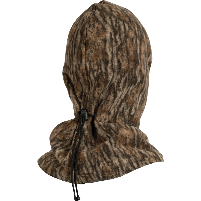 MST Face Mask: A midweight fleece mask with a hood, black strap, and zipper. Tailored eye and mouth openings for breathability and visibility. Adjustable back cinch for a secure fit. Ideal for cooler temperatures and outdoor activities.