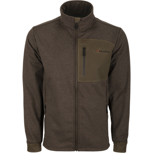 McAlister Heritage Hybrid Windproof Jacket: A durable, lightweight jacket with a cotton/polyester shell and polyester fleece lining. Features include a waxed cotton left chest pocket and zippered slash pockets for convenient storage. Perfect for outdoor activities.