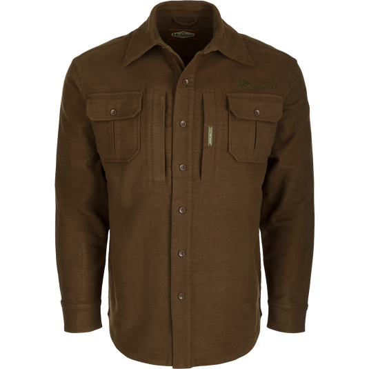 A brown jac-shirt with pockets, crafted with cotton/spandex blend and dry waxed canvas elbow patches. Windproof and stretchy for unrestricted movement.