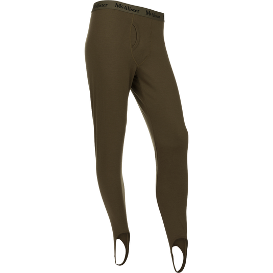 McAlister Merino Base Layer Pant: A pair of holey trousers with elastic waistband and foot stirrups for comfort and secure fit.