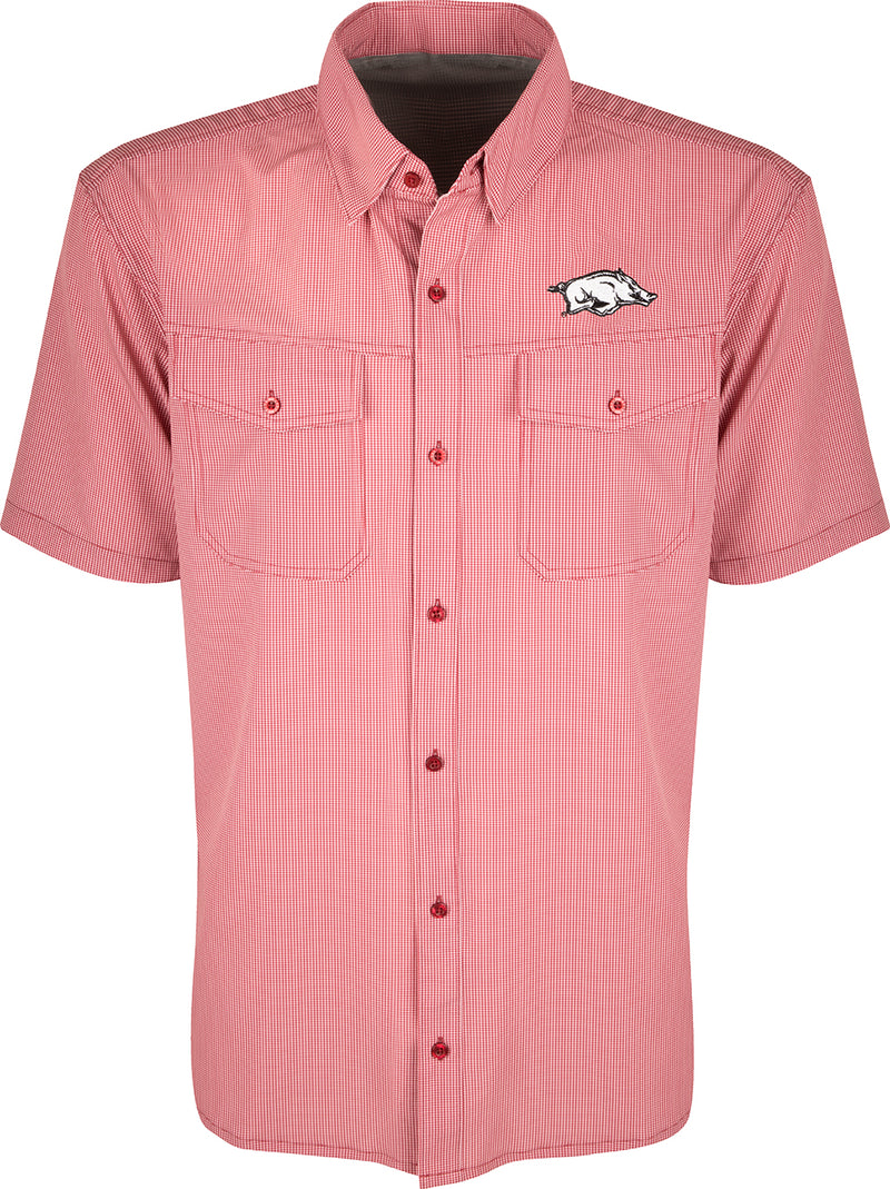 Arkansas S/S Traveler's Shirt: A lightweight, breathable plaid shirt with four-way stretch for freedom of movement. Features moisture-wicking fabric and two chest pockets with button flaps. Ideal for early season baseball games and weekend tailgates.